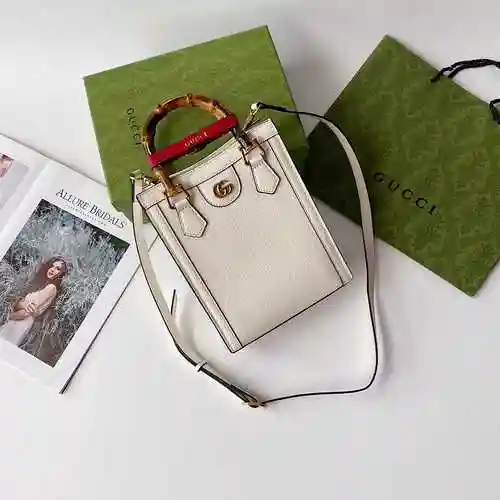 El mini bolso de mano GUCC adopta una bolsa de regalo de entrega de alta calidad de piel de vaca ori