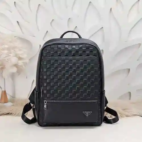 PRA@DA La mochila para hombre está hecha de cuero original importado de primera calidad con una bols